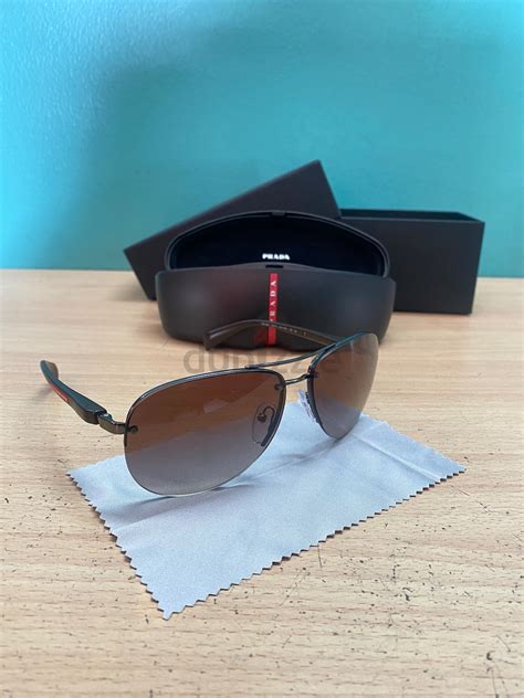 sunglasess prada|prada unisex sunglasses.